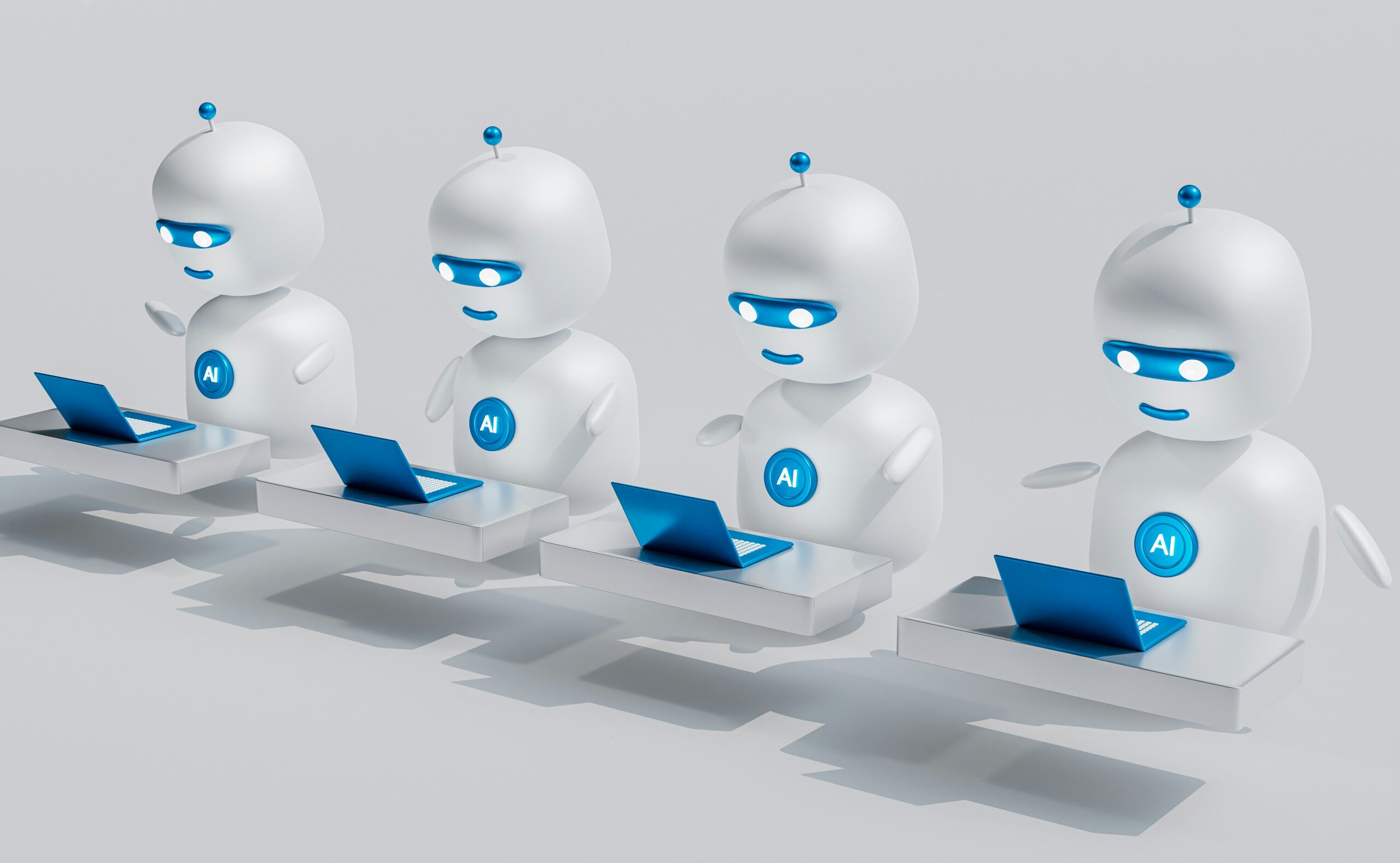 A line of robots using laptops.