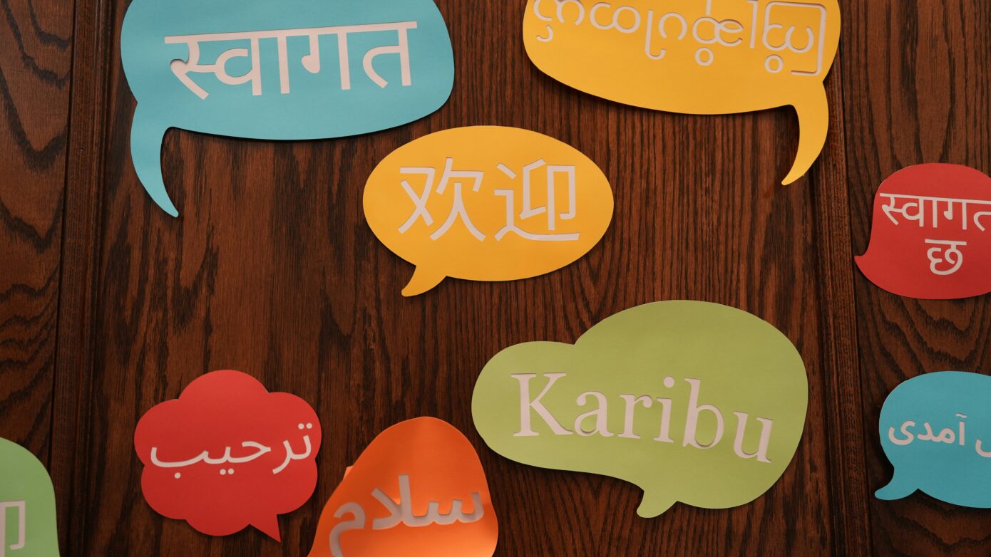 Word bubbles with words from various languages inside them.